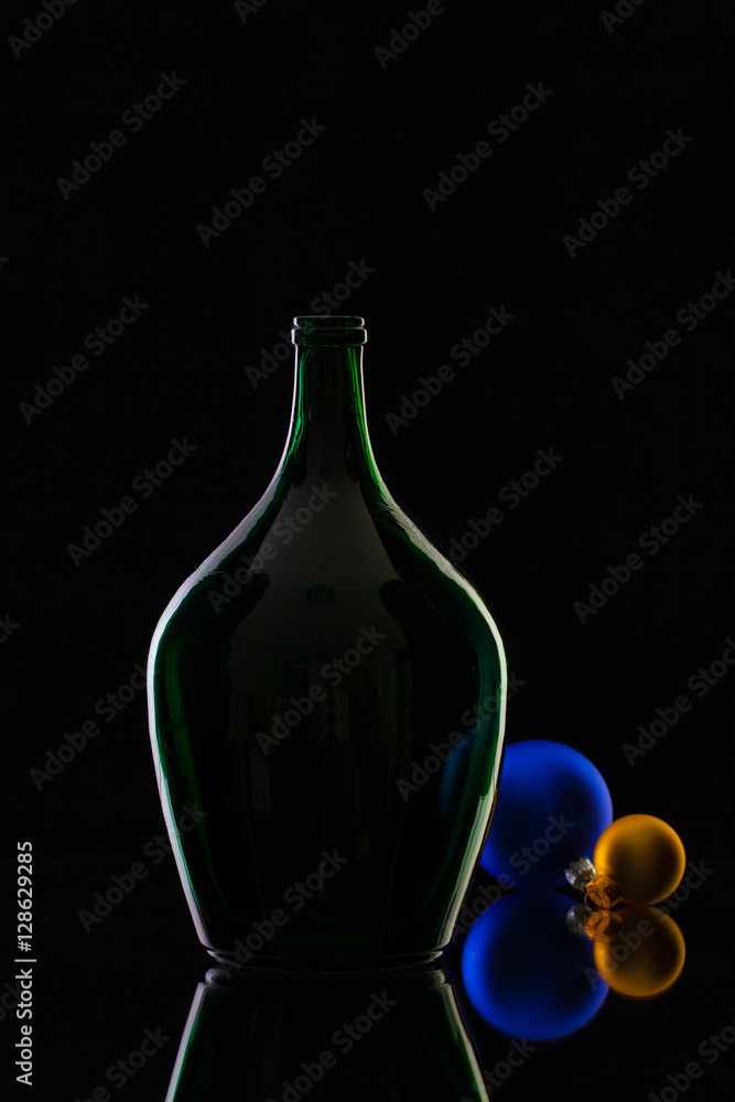 Silhouette of elegant and very old wine bottlesand Christmas dec Silhouette of elegant and very old wine bottlesand Christmas dec