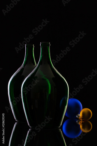 Silhouette of elegant and very old wine bottles and Christmas dec
