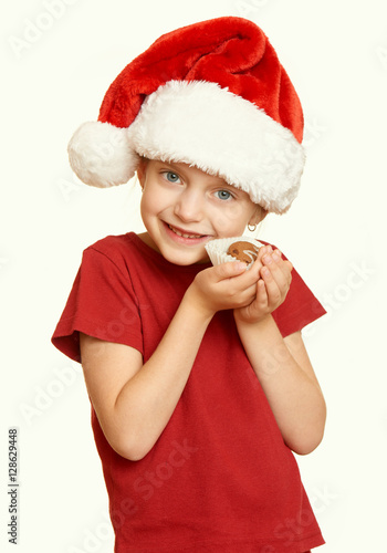 girl with cookies for santa  winter holiday christmas concept  yellow toned