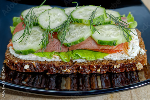 Open-faced smoked salmon sandwich photo