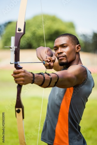 Athlete practicing archery