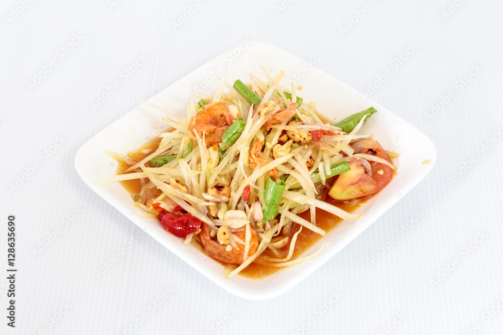 Thai food papaya salad on white dish Thai food papaya salad on white dish
