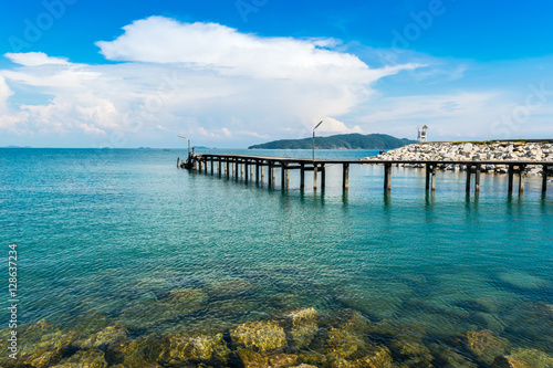 The beach and Wooden bridge Viewpoint in beautiful blue sky, sea © yongyutp