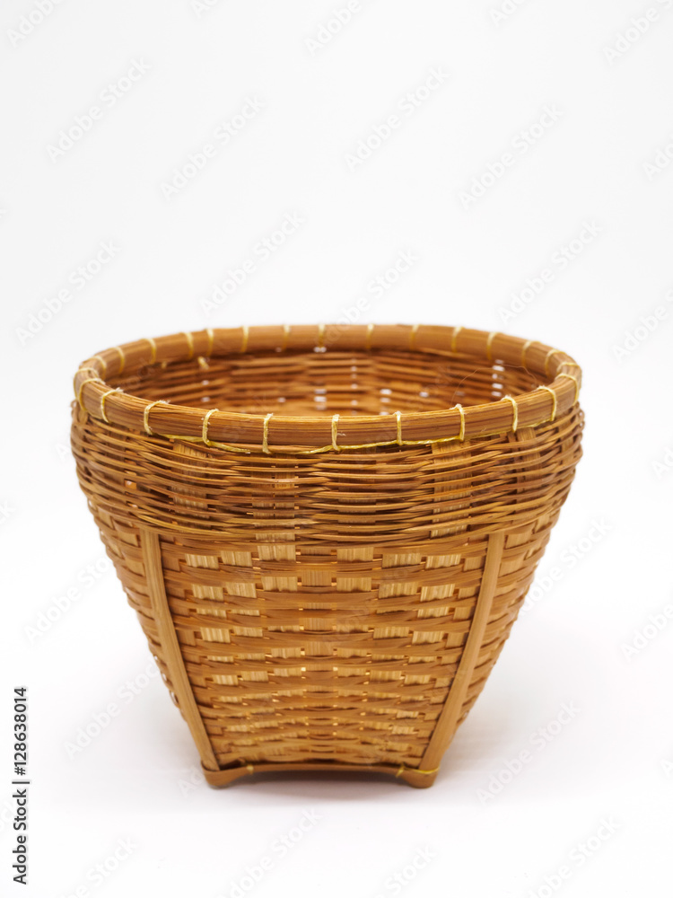 Empty brown wicker woven basket isolated Empty brown wicker woven basket isolated