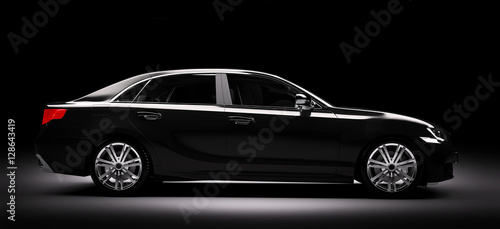 New black metallic sedan car in spotlight. Modern desing, brandless.