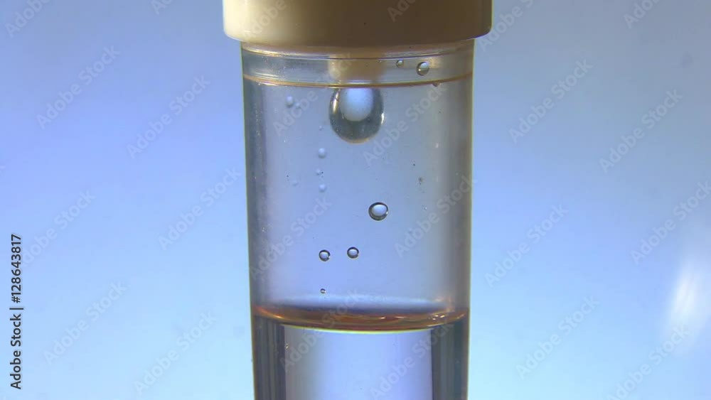 I.V. Intravenous saline drip in extreme closeup I.V. Intravenous saline drip in extreme closeup