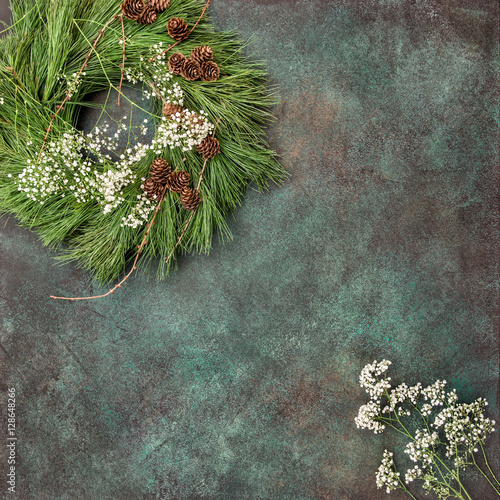 Christmas wreath with pine cones white flowers vintage photo