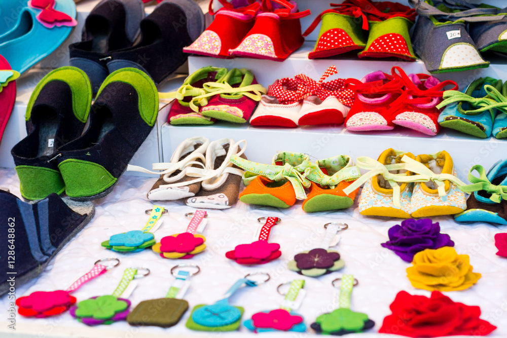 Christmas market selling handmade slippers.