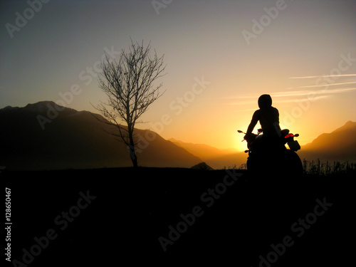 Sunset motorbike rider
