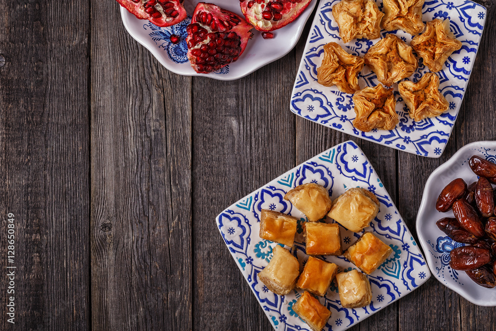 Oriental sweets with dates and pomegranate. Oriental sweets with dates and pomegranate.