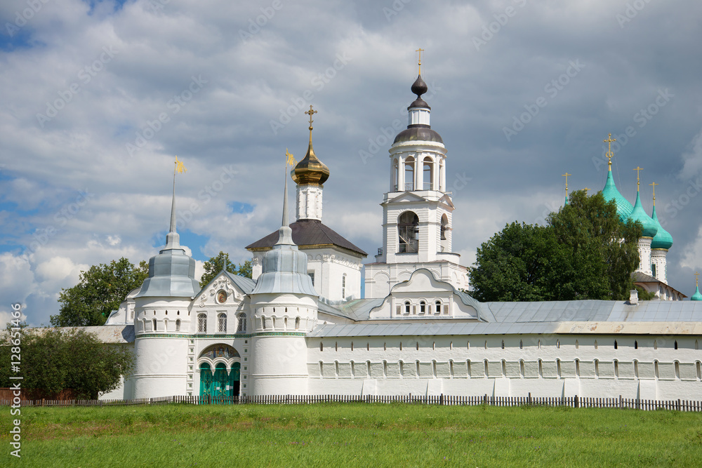 View of the Sacred gate and St. Nicholas Church in the cloudy July afternoon. Vvedensky Tolga Convent, Yaroslavl. Golden Ring of Russia