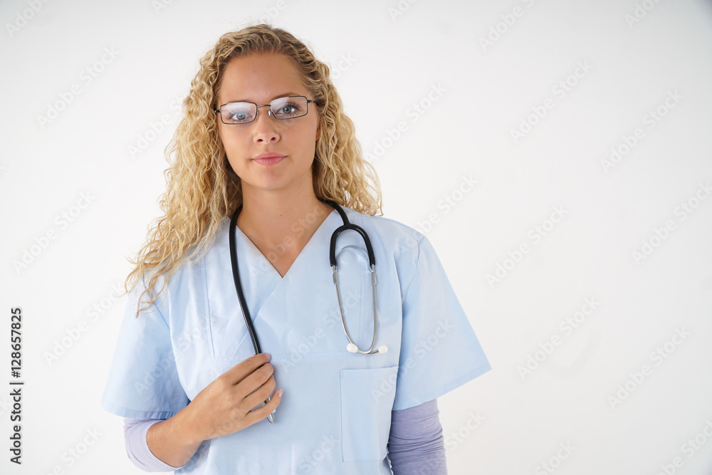 Young cute blonde nurse with eyeglasses and stethoscope around her neck