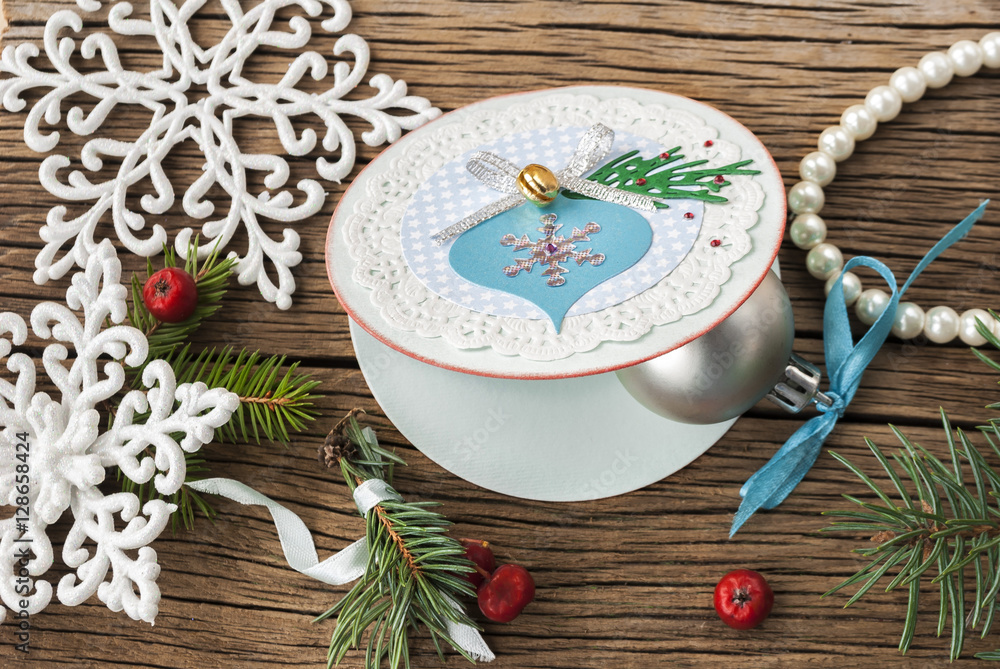 Greeting card for Christmas on a wooden table Greeting card for Christmas on a wooden table