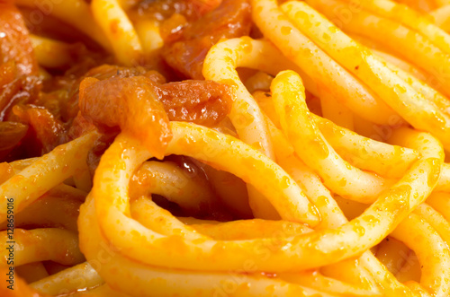 Close-up view of the cooked spaghetti with onion sauce