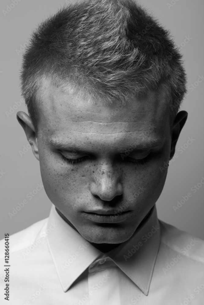 Fashionista concept. Portrait of brutal young man with short hair
