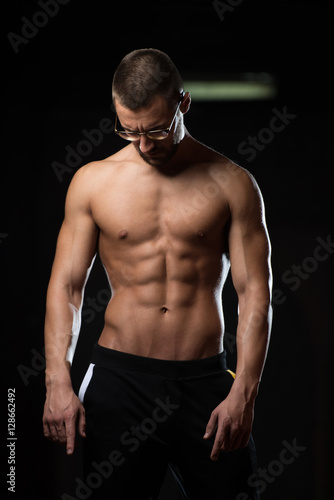 Portrait Of A Physically Fit Muscular Nerd Man