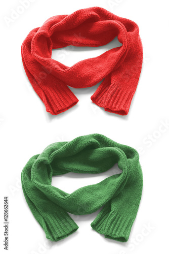 Red and green warm scarves on a white background.