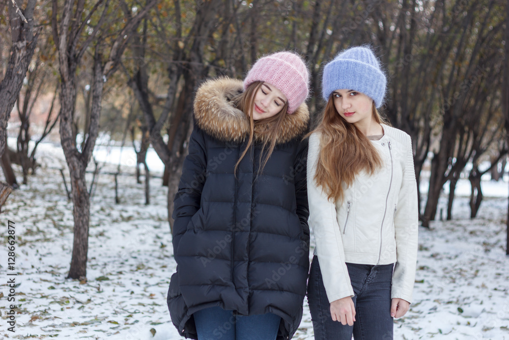 Beautiful girl on the nature in the winter outside in winter hat Beautiful girl on the nature in the winter outside in winter hat