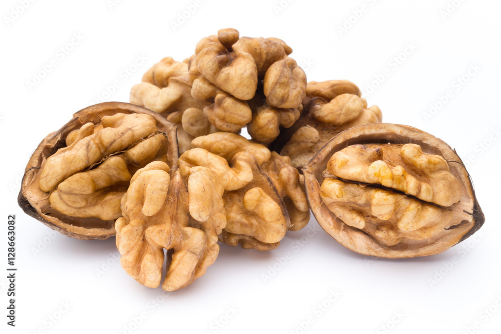 Walnut and walnut kernel isolated on the white background. Walnut and walnut kernel isolated on the white background.