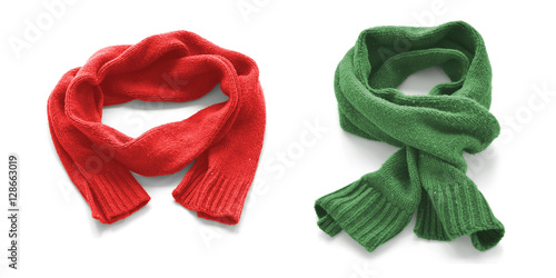 Red and green warm scarves on a white background.