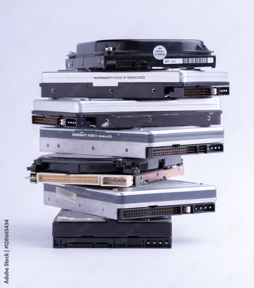 Obraz premium Pile of old hard drive on white background.