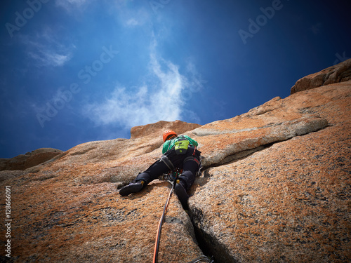 Trad climbing on granit in Alps