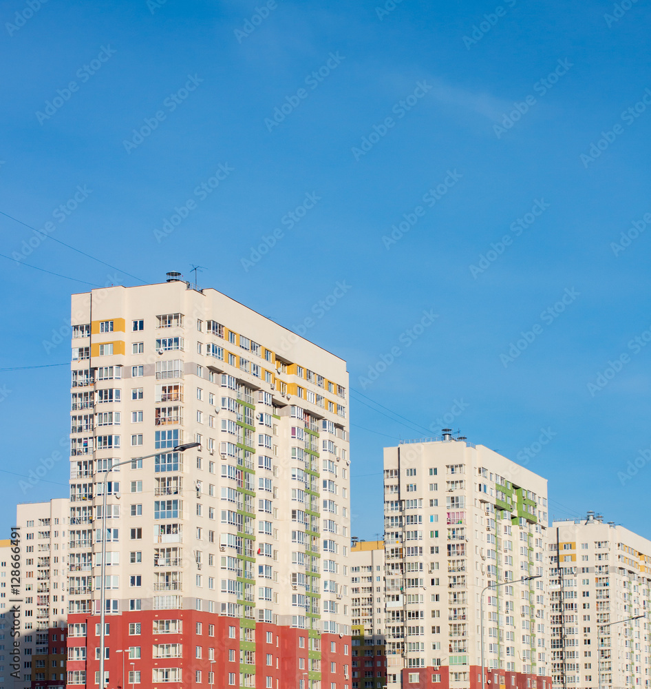 Condominium in the city on a clear day Condominium in the city on a clear day