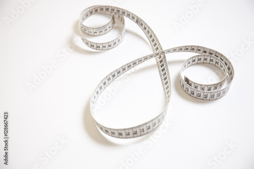 Measure tape and white background