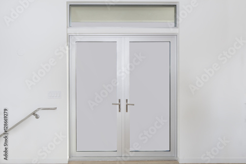 Aluminum door with double glass window and copy space for your background. 