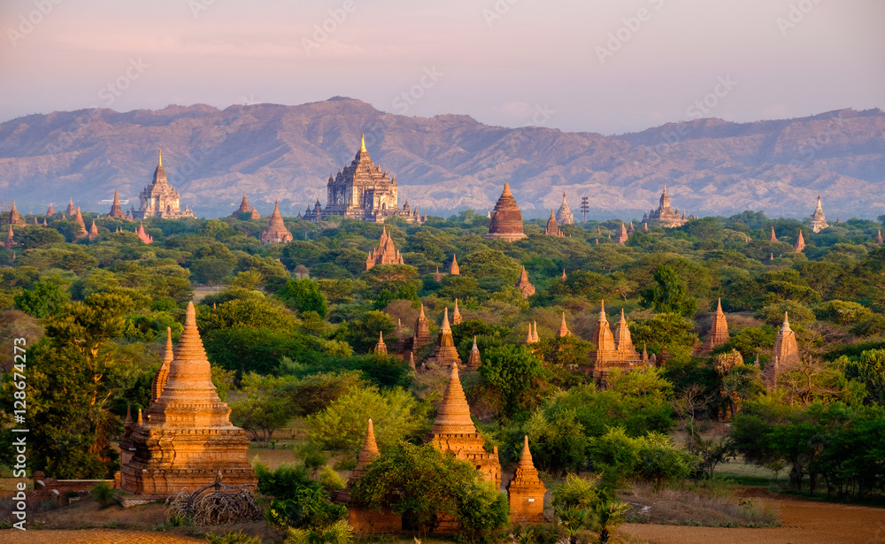 Sunrise landscape view with silhouettes of old temples, Bagan - obrazy, fototapety, plakaty 