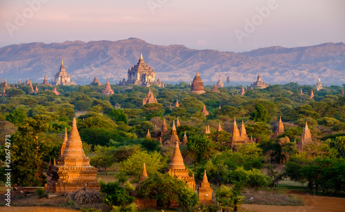 Sunrise landscape view with silhouettes of old temples, Bagan photo