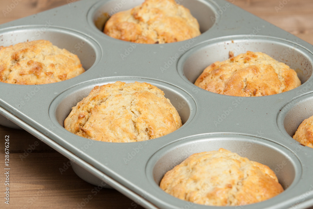 Homebaked Upside Down Maple And Apple Muffins In Baking Tray. Homebaked Upside Down Maple And Apple Muffins In Baking Tray.