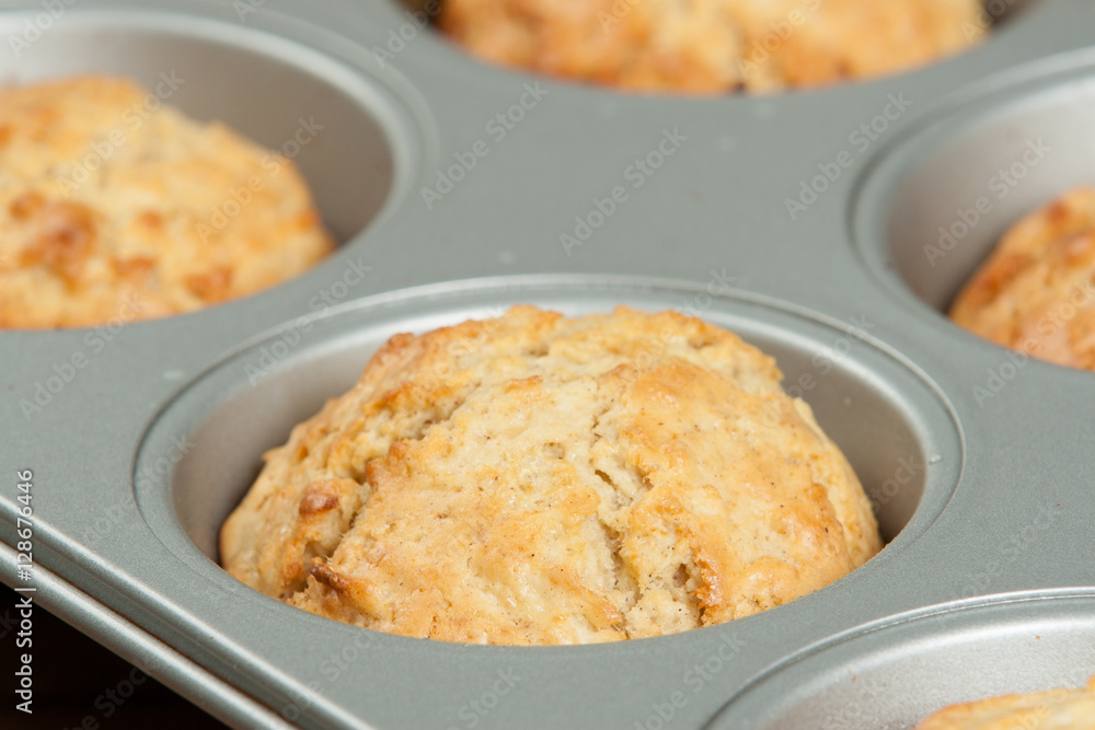 Homebaked Upside Down Maple And Apple Muffins In Baking Tray. Homebaked Upside Down Maple And Apple Muffins In Baking Tray.