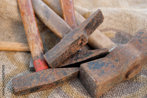 group of old hammer, rusty tools
