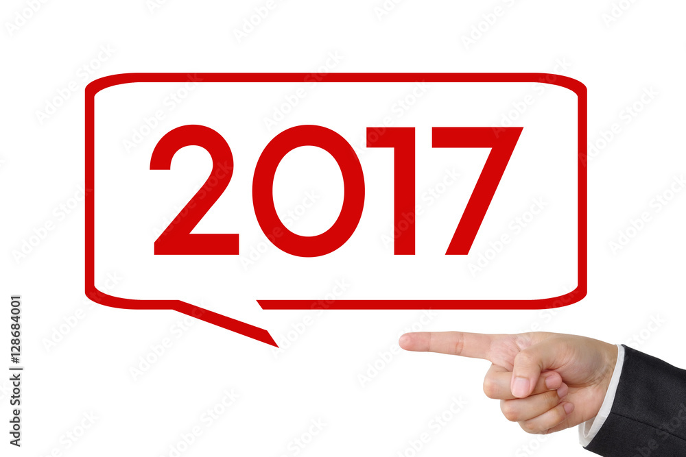 Businessman hand pointing 2017 sign on white background Businessman hand pointing 2017 sign on white background