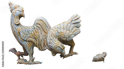Rooster, hen and chicken carved from marble, isolated on white © maykal