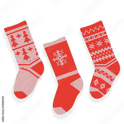 Red christmas knitted stocking isolated on white background.