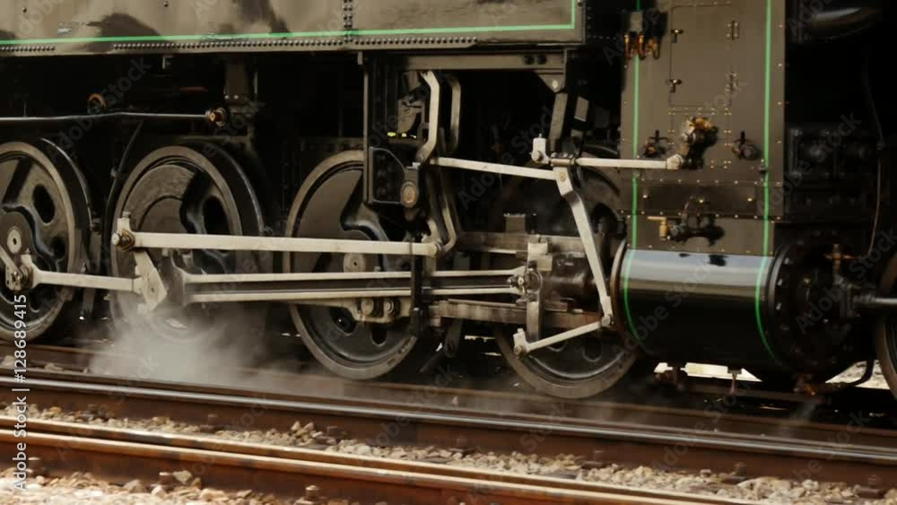 locomotive wheels in motion. old technology background. locomotive wheels in motion. old technology background.