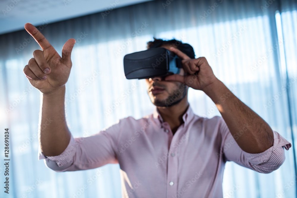 Businessman using an oculus Businessman using an oculus