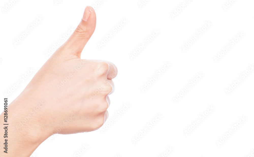 Hand (woman) giving thumbs up on white background. Hand (woman) giving thumbs up on white background.