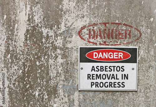 red, black and white Danger, Asbestos Removal in Progress warnin