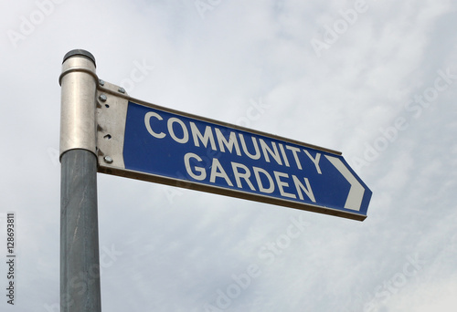 blue and white Community Garden sign