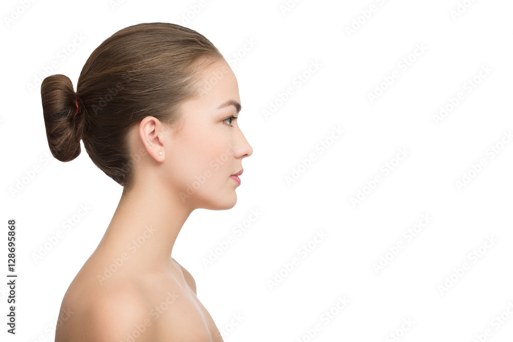 Portrait of profile charming woman with bared shoulders isolated on white background with copyspace Portrait of profile charming woman with bared shoulders isolated on white background with copyspace
