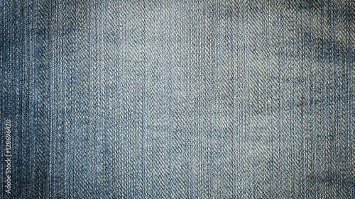 Denim jeans texture, denim jeans background. Old grunge vintage denim jeans. Stitched texture denim jeans background of jeans fashion design.
