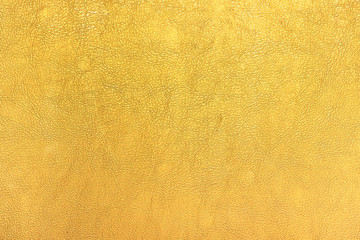 Bright gold color leather texture background