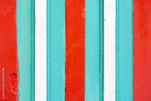 Striped white, green and red wood texture