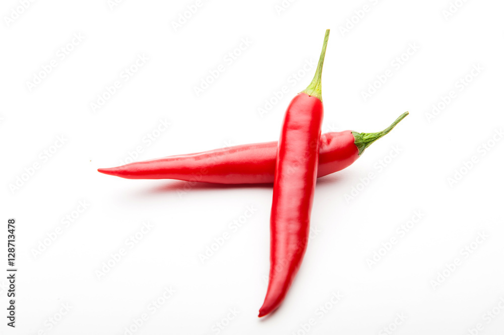 red chilli peppers on white background red chilli peppers on white background