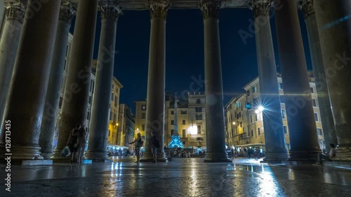 Roman Pantheon Interior Time-lapse. Time-lapse looking out from behind the Roman Pantheon's large granite Corinthian columns, in Rome, Italy. photo
