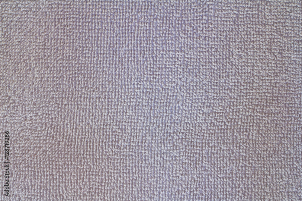 Fototapeta premium Gray natural cotton towel background, closeup photo texture