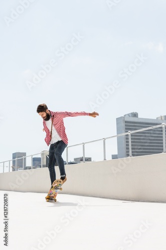 Hipster man doing skateboard © WavebreakmediaMicro